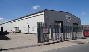TO LET - Large bay warehouse with yard 